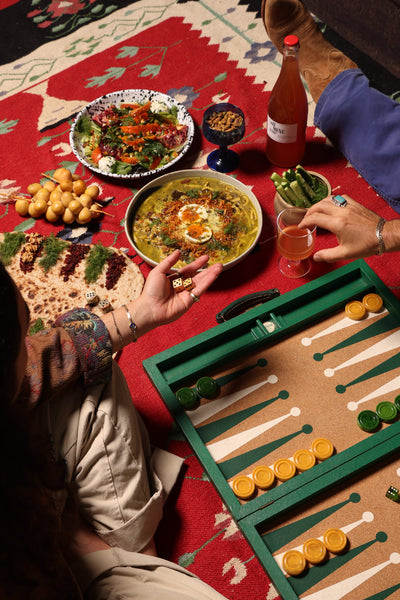 BACKYARD BACKGAMMON & BIITES