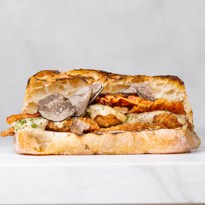 The Mona Lisa Cutlet Cacio e Pepe Black Truffle Sandwich by Ggiata